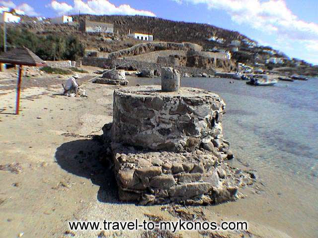 ORNOS BEACH - Ornos has a small picturesque port in which anchor the fishing boats.