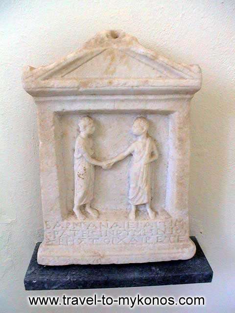 ARCHAEOLOGICAL MUSEUM - A grave stele that was found at Rheneia island.