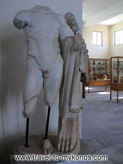 ARCHAEOLOGICAL MUSEUM - The statue of Heracles from Rheneia. It is a hellenistic copy of a 5th-century. It was found in 1899 in the Sanctuary of Heracles.