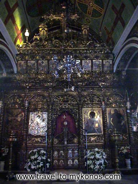 MONI TOURLIANIS - The splendid chancel screen of the church pulls the attention of pilgrims.