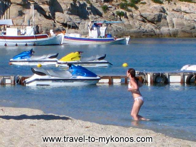 GIRL - A girl exiting the sea at Kalafatis beach