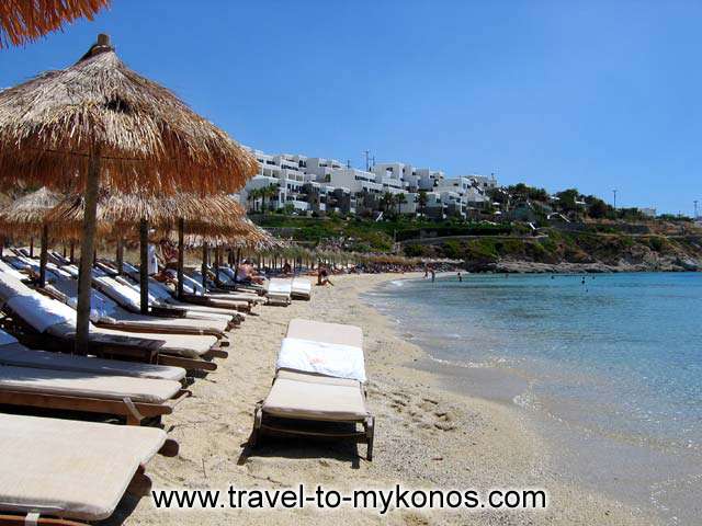 UMBRELLAS - The organised part of Psarou beach in front of Psarou beach hotel and Namos restaurant