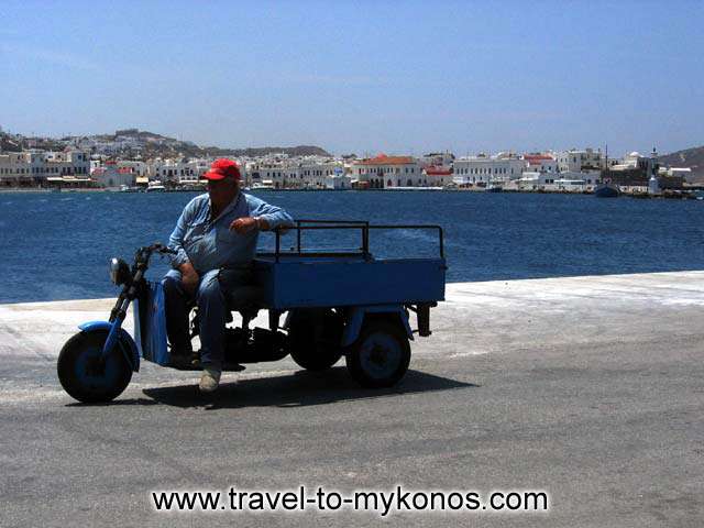 WAITING - These are the only means of transportation for goods inside Chora in Mykonos