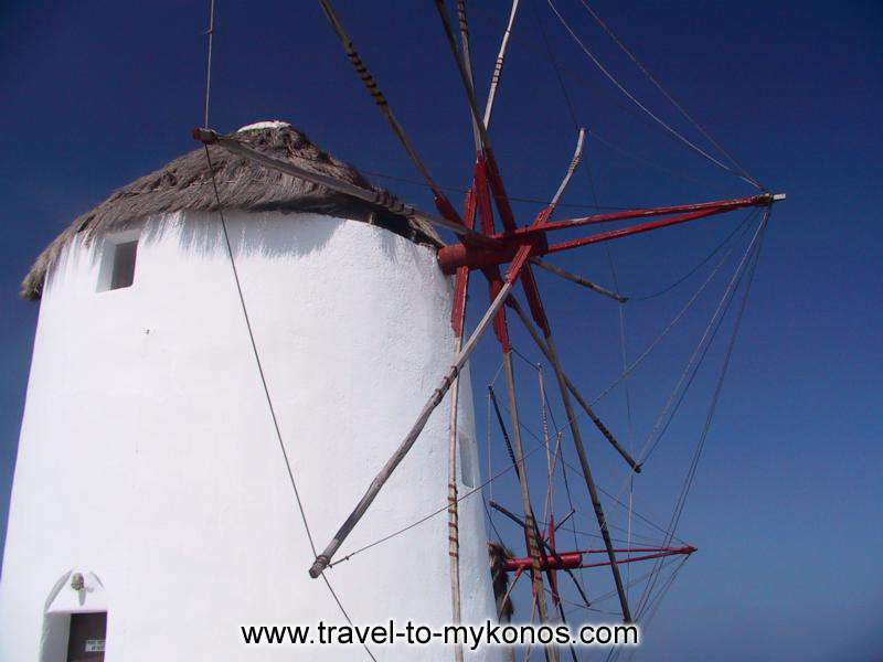 WINDMILL - Round, white, with the wooden conical roof windmill it reminds in the visitors passed seasons...