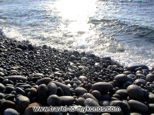 CHOULAKIA BEACH - The pebbles on Choulakia beach. It´s a natural monument of beauty. Small and picturesque attracts many tourists. The prehistoric pebbles on the beach are unique in Mykonos.