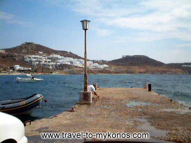 AGIOS IOANNIS BEACH - The sea wall of Agios Ioannis in which anchor the boats.