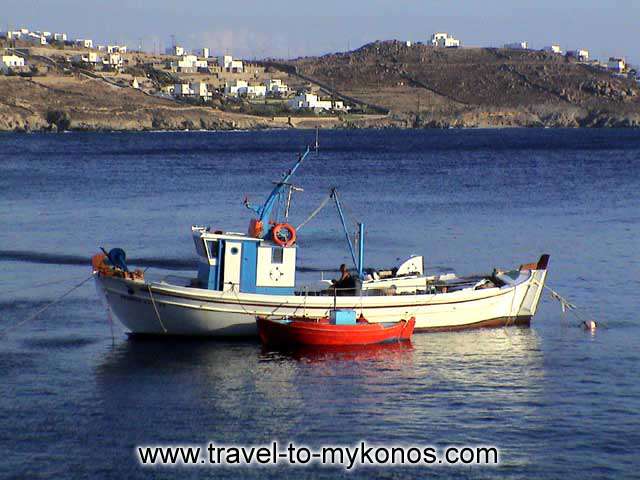 AGIOS IOANNIS BEACH - In a few hour the fishing boat will come out in Aegean Sea...